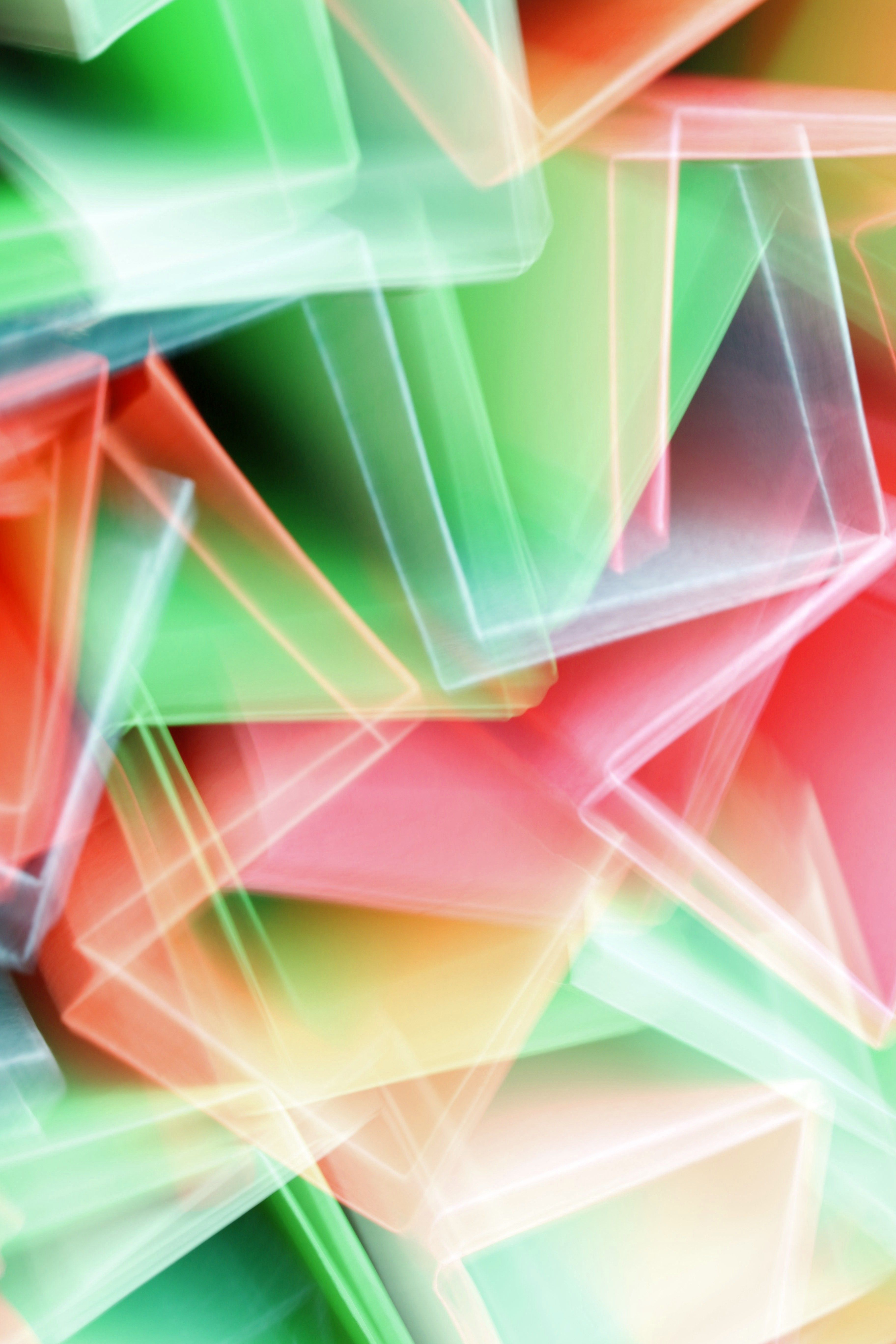 Green and red translucent abstract shapes for Subscriptions and Enterprise